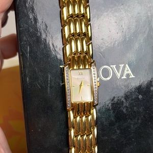BULOVA WATCH framed with 26 diamonds